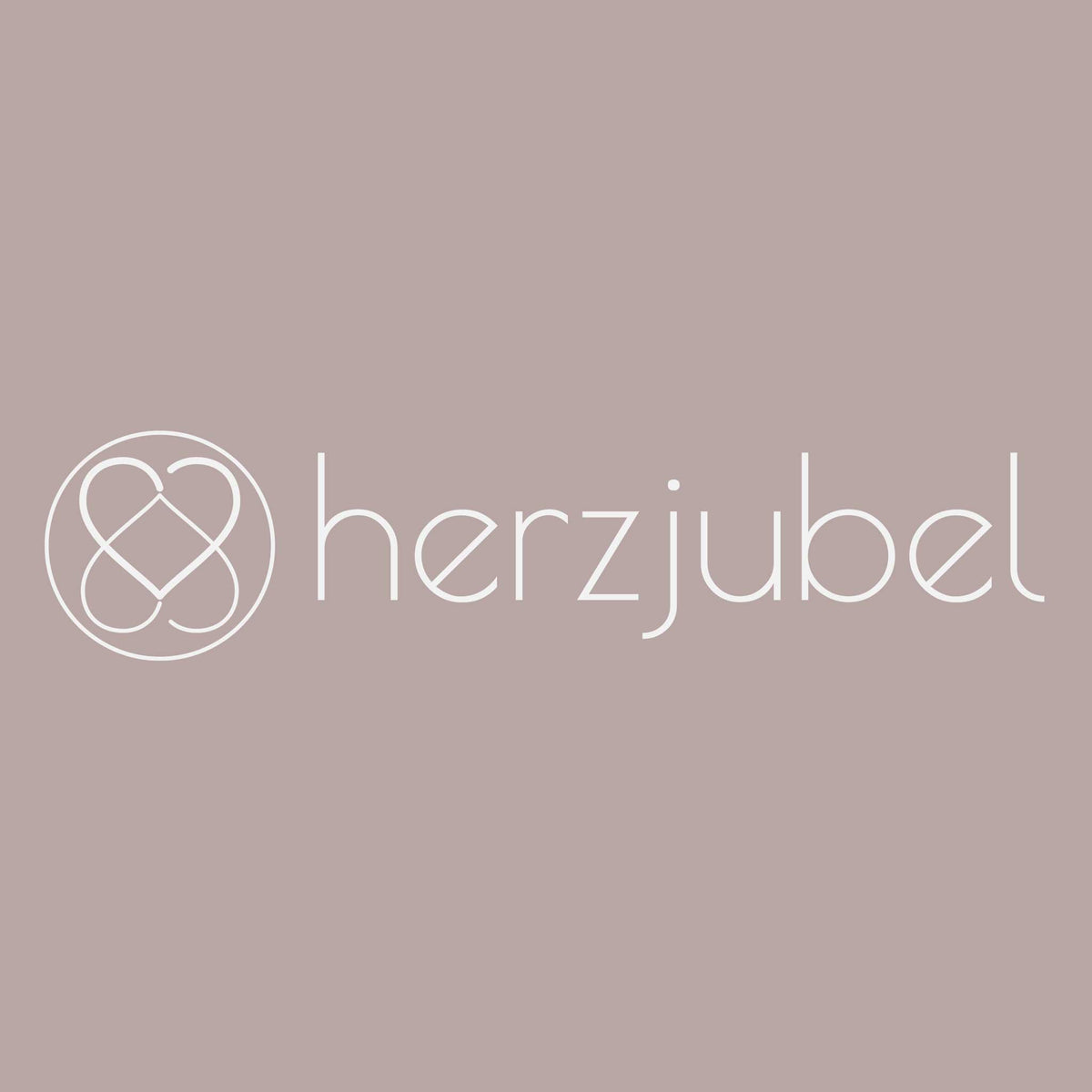 herzjubel Markenlogo in weiß auf rosefarbenem Hintergrund